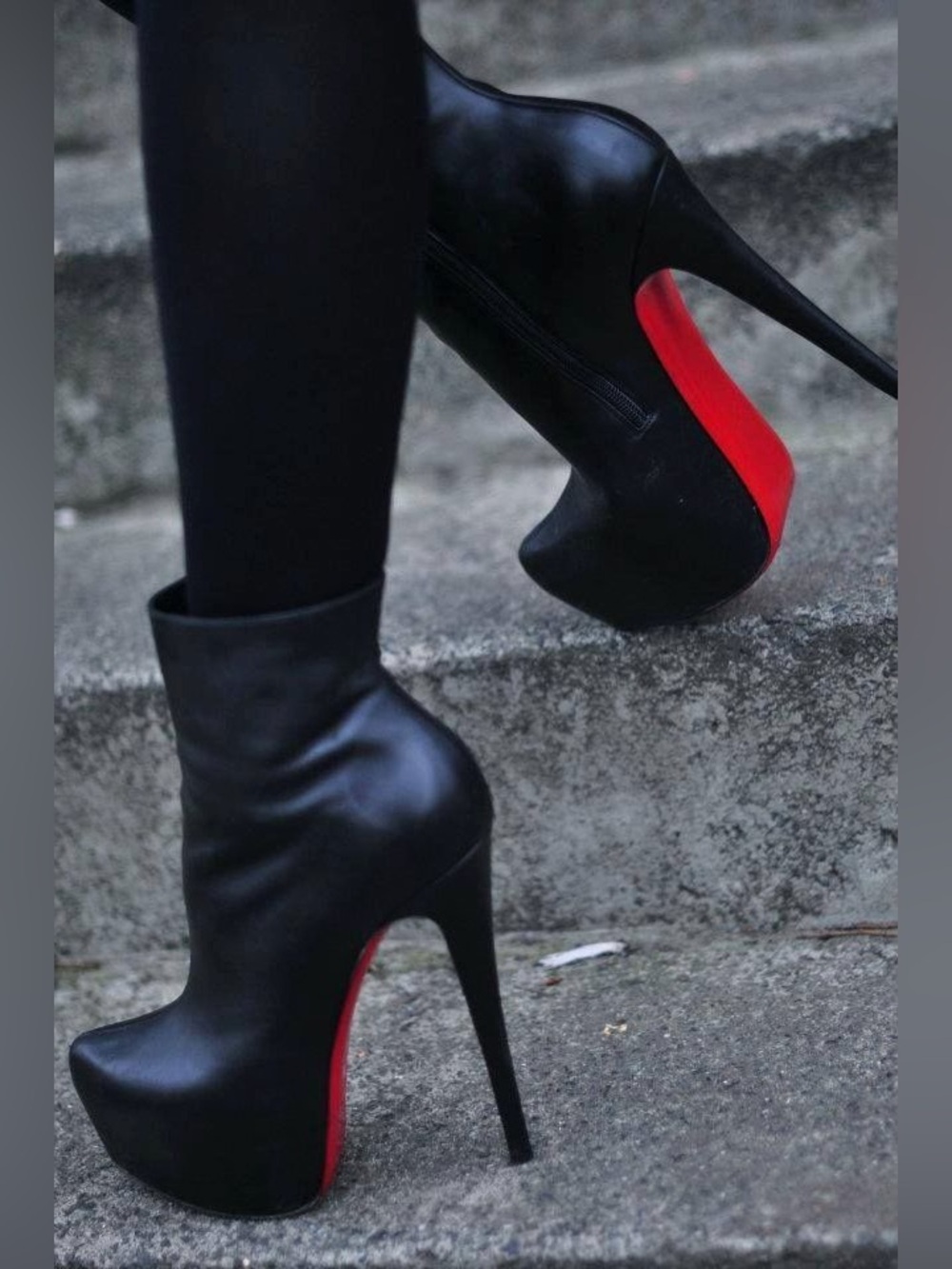 Christian Louboutin Daf Booty in shiny black calf leather